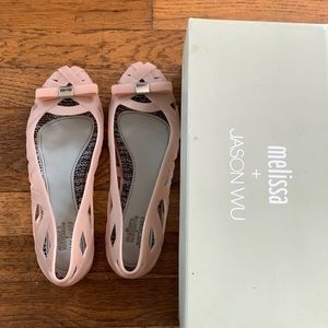 Melissa & Jason Wu light pink shoes , lightly used , they run small it’s size 8